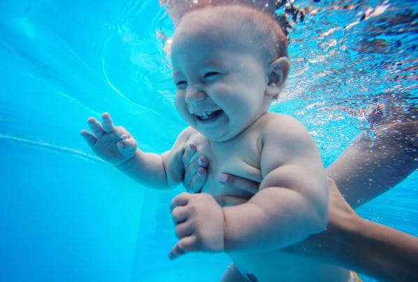 At what age is it advisable to let the baby enter a pool?